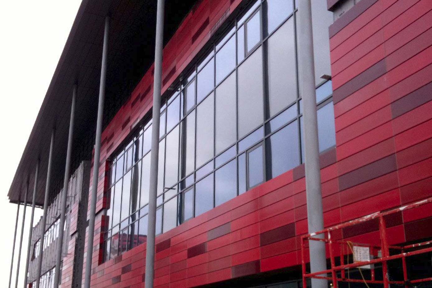 Close up of the red cladding on the Institute of Mental Health, Nottingham Uni