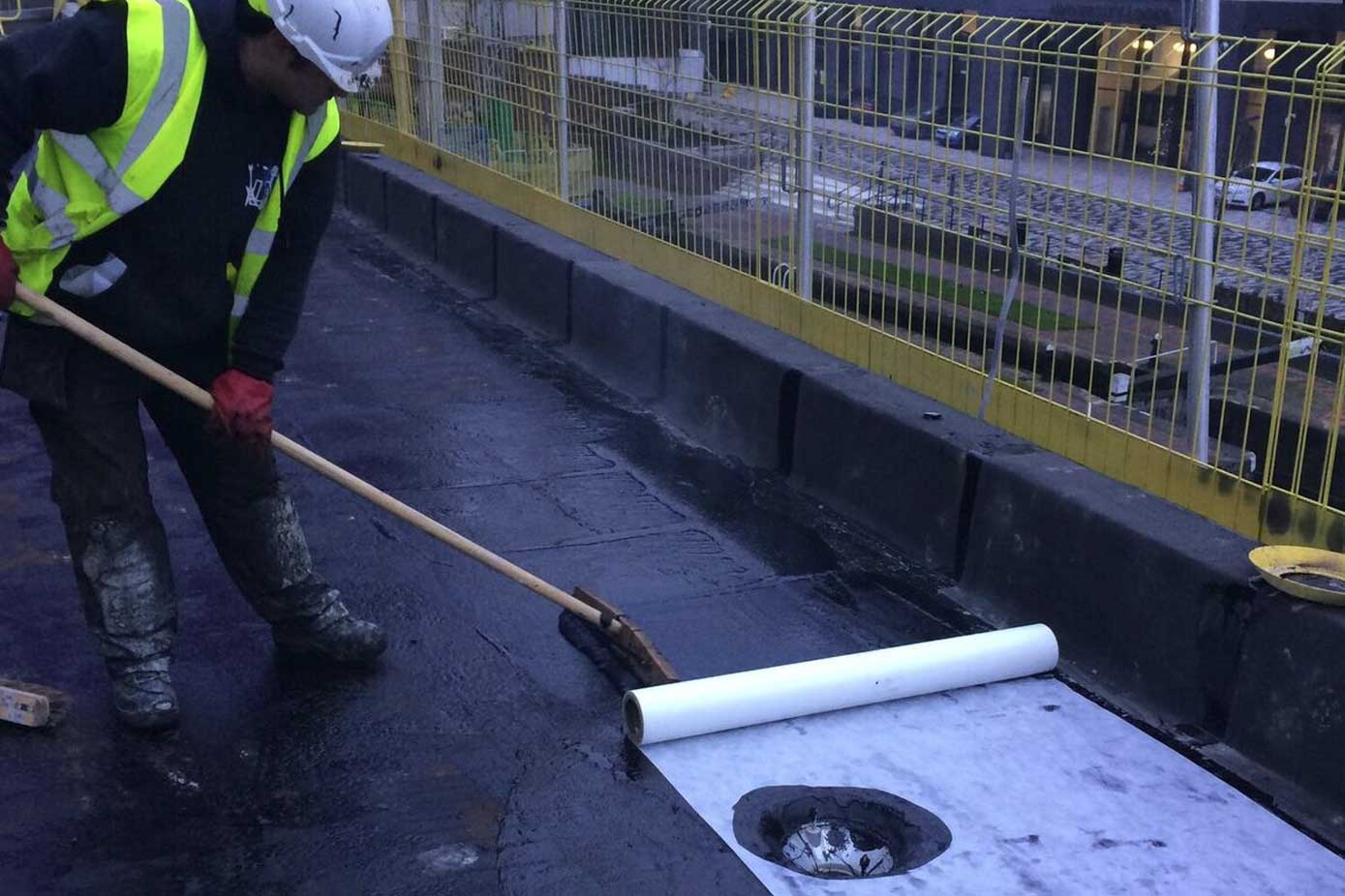 Hot melt membrane is layed on a flat roof